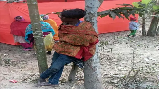 গাছের সঙ্গে বেঁধে চোরকে গণধোলাই